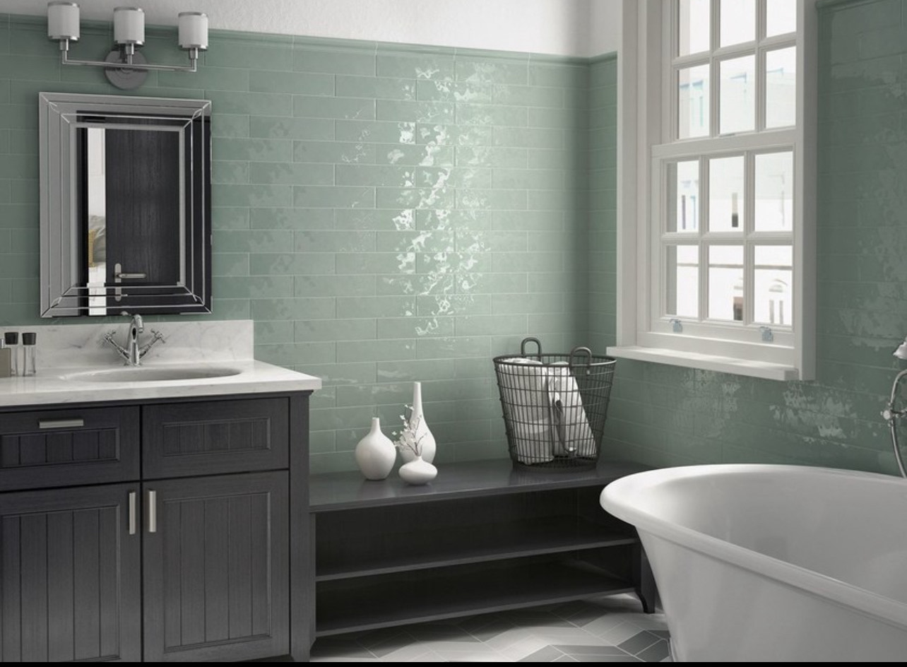 Bathroom tile work by Orleans Flooring Co. showing clean grout lines and careful installation